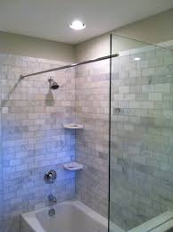 Check spelling or type a new query. This Tub Shower Benefits From A Glass Splash Panel As Well As The Rod For The Shower Curtain Frameless Seamles Glass Tub Enclosure Shower Tub Glass Shower Tub
