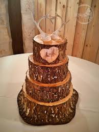 Forever After Cakes Tree Trunk Wedding Cake With Bark Carved Heart And Deer Horns Topper Country Wedding Cakes Wedding Cake Tree Wedding Cake Rustic
