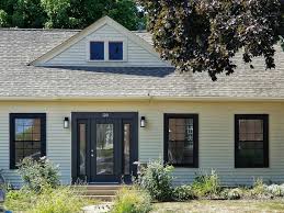 This project is aligned with our goals, at dk homes, of delivering custom homes and dark grey siding with white trim, choosing exterior house colors on a lakeside cottage. When It Comes To Windows Black Is Back Wallside Windows