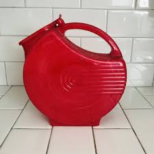 vintage red plastic disc pitcher lidded