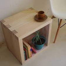 The base is crafted from solid acacia wood, and has three legs that meet in the center for a bold, structural look. Wooden Side Table Cube Coffee Table Kitchen Table With Storage Coffee Table