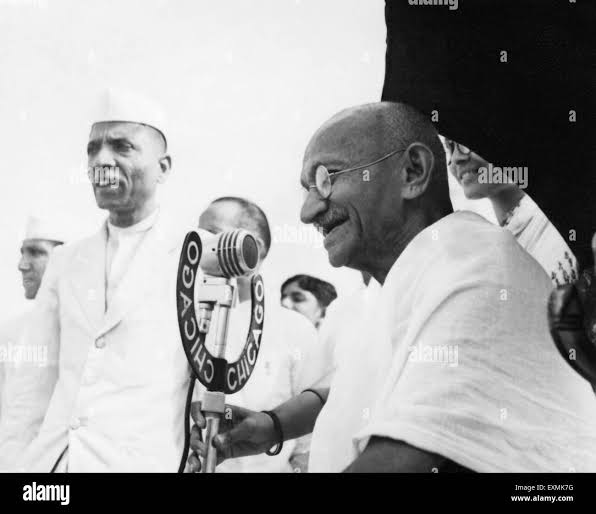 Mahatma Gandhi speaking into a mike at Pune India 1944 old vintage 1900s picture Stock Photo - Alamy