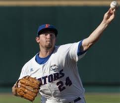 Bauer strikes out 11, Bruins win CWS opener 11-3