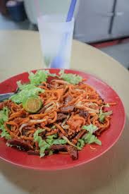 The basic idea is our good ol' mee goreng (mamak style) but the twist is he adds sotong. Bangkok Lane Mee Mamak Goreng Penang Thokohmakan