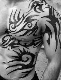 Tribal tattoos are the most ancient tattoo category, this class of the tattoo art is completely inspired by nature and signify complex meaning through simple tattoo patterns. 71 Sick Tribal Tattoo Ideas 2021 Inspiration Guide Tribal Tattoos For Men Tribal Arm Tattoos Tribal Chest Tattoos