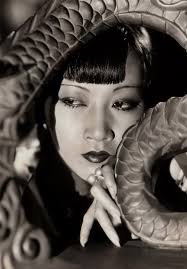 I was scrolling and saw that modern day pin-up artist, Olivia De Berardinis  added an Anna May Wong artwork to her 2025 calendar.