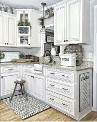 The beautiful cream finish is enhanced by the brushed glaze. Farmhouse Antique White Kitchen Cabinets Novocom Top
