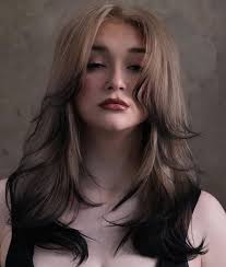 looking for someone who can do my hair like this. i already have natural  red hair and would want it toned and add the black. looking for something  pretty affordable. thanks in