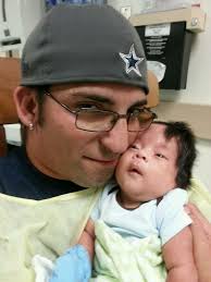 Guera and her children. Dad is close by.