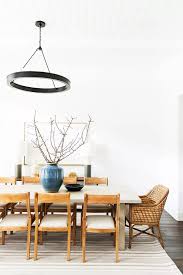 The Dos And Don Ts Of Mastering The Mismatched Dining Chair Trend Mismatched Dining Chairs Boho Dining Chairs Woven Dining Chairs