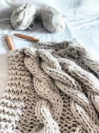 You can use either 2 strands of worsted weight yarn (as i did in the sample) or 1 strand of bulky weight. Chunky Cable Knit Blanket Pattern Handy Little Me
