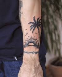Placement of palm tree tattoos. 91 Beautiful Palm Tree Tattoo Designs For Tree Lovers