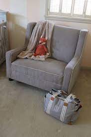 Pin By Lindsay Irvin On If It S A Girl Trendy Baby Nursery Nursing Chair Nursery Rocker