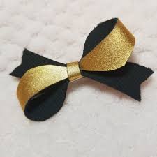 I literally only have 2 of these in stock and unless you request more then i wont be making anymore. Black And Gold Hattie Bow Luxybow