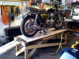 Diy Motorcycle Repair Stand Diy Motorcycle Motorcycle Workshop Dirt Bike Room