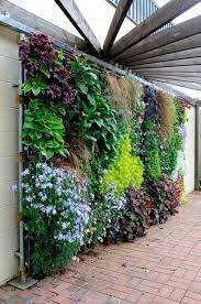 Vertical garden ideas are various garden designs that incorporate modern and old fashioned indoor and outdoor set up. 13 Imaginative Wall Garden Ideas For The Uninspired Yard Surfer Vertical Garden Diy Vertical Garden Design Small Garden Design