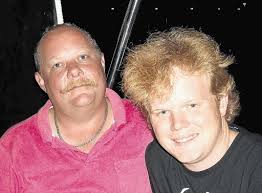 Gay couple tie knot behind prison doors