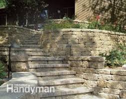A retaining wall is an integral part of any sloped yard. How To Choose The Right Retaining Wall Material Diy Family Handyman