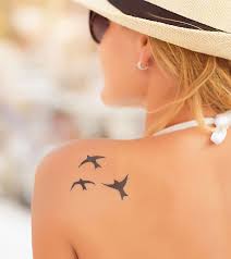 A pair of birds has already settled on the branch too. 33 Adorable Bird Tattoo Designs With Meanings