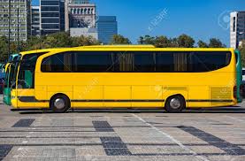 Sourcing guide for bus side view mirror: Modern Yellow Bus On City Street At Summer Season Side View Stock Photo Picture And Royalty Free Image Image 70214311