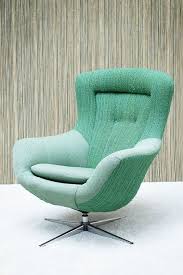 When Most People Think Of Wool It S Usually A Fabric That Goes With Rustic Styles You May Imagine Woo Swivel Chair Mid Century Modern Furniture Modern Chairs