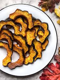 Smoky Maple Roasted Acorn Squash Budget Bytes Place the squash cut side down and evenly spaced on the baking sheet.