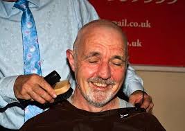 Southport Rotarians 'Brave the Shave' in aid of Macmillan Cancer Support