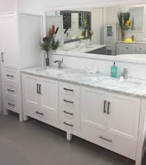 Lavatories and the sculptural tub in pristine white provide a sharp contrast in the color palette. Palmera 90 Inch Double Sink Bathroom White Vanity Side Cabinet Tower