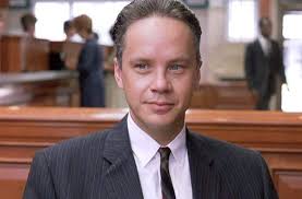 Where did Andy Dufresne get the legal identification to withdraw all Warden  Norton's money from the twelve banks after Andy's escape in The Shawshank  Redemption?