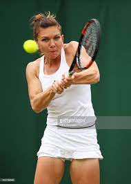 Simona Halep Of Romania Plays A Backhand During The Ladies Singles Simona Halep Wimbledon Tennis Simona Halep Wimbledon