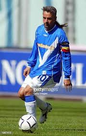 The man who inspired entire generations to play football. Roberto Baggio Of Brescia In Action During The Serie A Match Between Juventus And Brescia Played At The Stadio Delle Alpi Turin Roberto Baggio Roberto Brescia