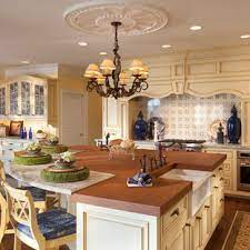 The furniture is a little more feminine with curved or turned legs. 75 Beautiful French Country Kitchen With Yellow Cabinets Pictures Ideas July 2021 Houzz