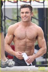 Patrick murphy details the diet and training regimen that got zac efron absolutely shredded for 'baywatch' this link opens in a new window. Zac Efron Goes Shirtless For Tarzan Like Baywatch Moment Zac Efron Goes Shirtless For Tarzan Like Ba Zac Efron Shirtless Zac Efron Baywatch Zac Efron Hair