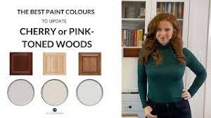 Artwork and kitchen accessories repeat the room's color scheme. Wood Cabinets Cherry Red Or Pink The Best Paint Colours To Update Them Youtube