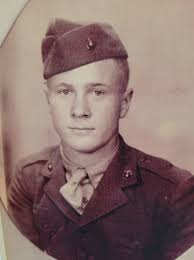 Centered photo of Korean War veteran with brown hair and eyes
