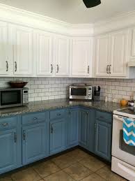 Pale grey subway tiles are laid in a herringbone pattern and is paired with stark white walls and ceiling. Image Result For Subway Tile Kitchen Color With Slate Appliance Upper Kitchen Cabinets New Kitchen Cabinets Trendy Kitchen Tile