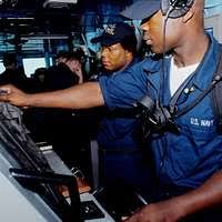 Machinist Mate Fireman Vincent Strickland records low-pressure air gauge  readings aboard the aircraft carrier USS Nimitz (CVN 68).