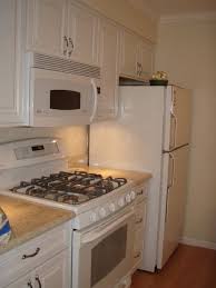 This photo gallery has pictures of kitchens featuring white kitchen cabinets in traditional styles. Tiny Galley Kitchen Galley Kitchen Renovation Galley Kitchen Remodel Small Galley Kitchens