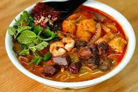 In the southern part of malaysia and its neighbouring country, singapore, it is sometimes called curry laksa (malay: Penang Curry Mee Jia Li Mian Noodle House å®¶é‡Œé¢é£Ÿé¦† Kl