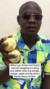 Plucking Ripe Mango in The Dream