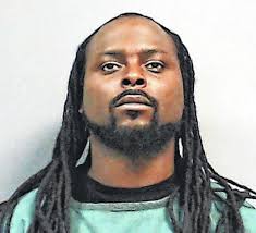 Murder suspect in custody