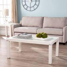 The contemporary design will bring a graceful touch to any home decor, from modern to traditional farmhouse style. Orren Ellis Arbyrd Parsons Coffee Table Wayfair