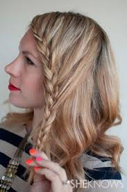 The remainder is dragged to the side and twisted into a low bun. How To Create A Cute Front Braid Braided Hairstyles Hair Styles Cool Hairstyles