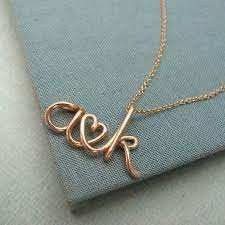 It all depends on how you wish to. The Original Two Lovers 14k Gold Filled Personalized Etsy Custom Initial Necklace Initial Necklace Custom Initials