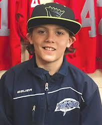 Local Atom hockey player makes Team Brick Alberta