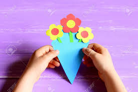 Paper folding, origami and cut paper flowers. Small Child Made Paper Flowers For Mother S Day Or Birthday Stock Photo Picture And Royalty Free Image Image 77398866
