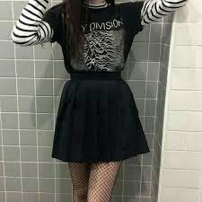 Black skater dresses with chunky boots, and midi skirts with ripped tights. Pleated Mini Skirts More Grunge Fashion With Some Nice Fishnet Tights
