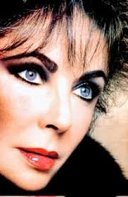 She was always smoking a cigar and dressed like a man. The sidewalk in  front of the post office was her domain, she kept it swept clean. She died  in 1969 and