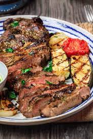 Mediterranean Grilled Lamb Recipe With Mint Pesto The Mediterranean Dish Garlic Herb Marinated Leg O Mediterranean Cuisine Mediterranean Dishes Grilled Lamb