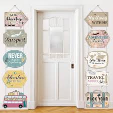 Wedding decor done with lots fo vintage suitcases, white blooms and greenery, a globe and a plane. Buy Let The Adventure Begin Sign Travel Cutouts Bon Voyage Banner Adventure Signs Party Supplies Door Sign Travel Themed Birthday Party Wall Decoration Signs 10 Counts Online In Turkey B07xz882y9